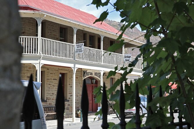 Dunedin to Queenstown One Way Tour Including Taieri Gorge Train - Riding the Taieri Gorge Railway: viaducts, gorges, and guided narration
