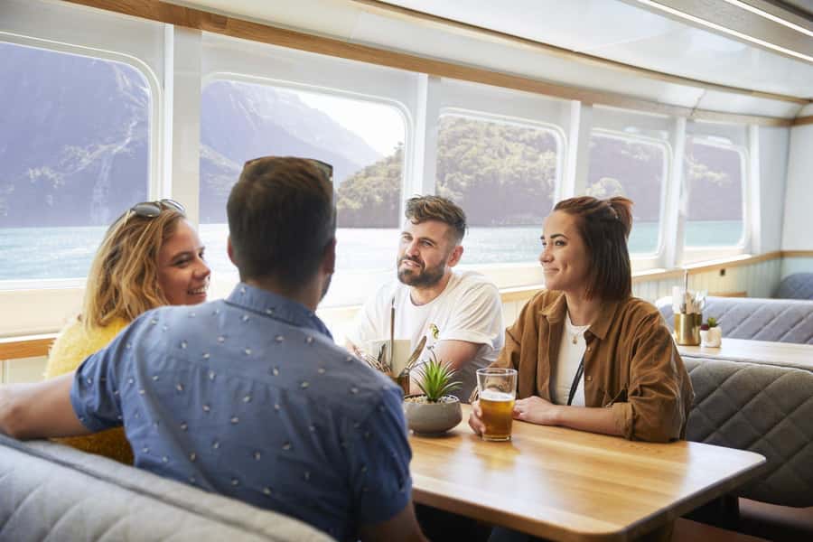 From Queenstown: Milford Sound Cruise and Coach Day Trip - Waterfalls, cliffs, and the mist you should expect