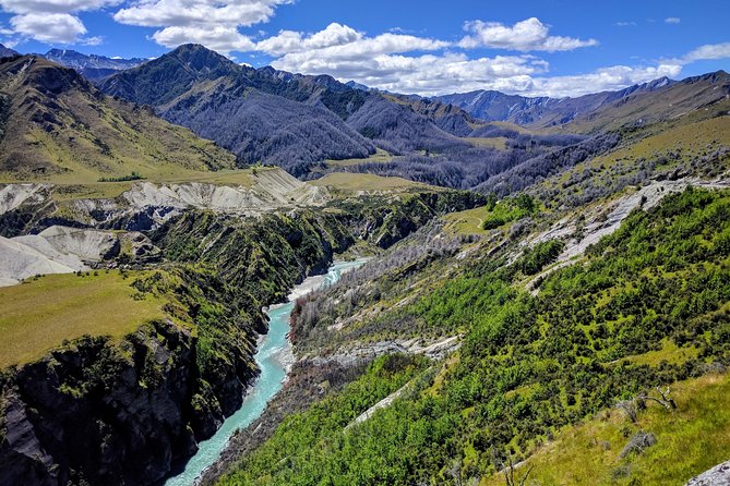 Skippers Canyon 4WD Heritage half day Tour from Queenstown - Skippers Canyon stops: suspension bridge, old township sites, and Lighthouse Rock