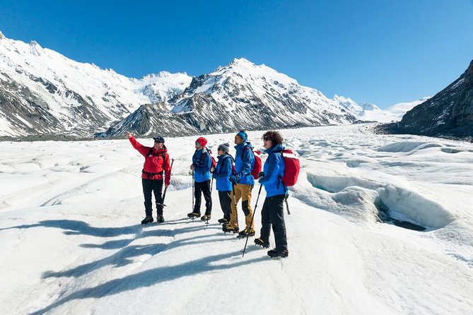 The Adventurer: Tasman Glacier Heli-hike - Landing on Tasman Glacier: boots, wool socks, and crampons